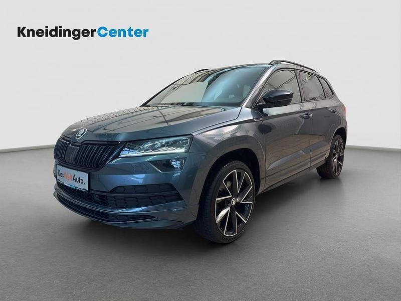 Dunkelgrau metallic Gebraucht 2021 Skoda Karoq SportLine SUV | € 22.900 (Guter Preis) - Bild 1/4