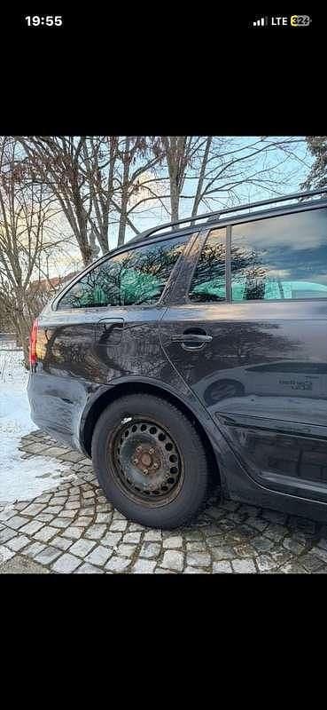 Gebraucht Skoda Octavia Ambition 105 PS (77 kW) 2012 Schwarz Kombi