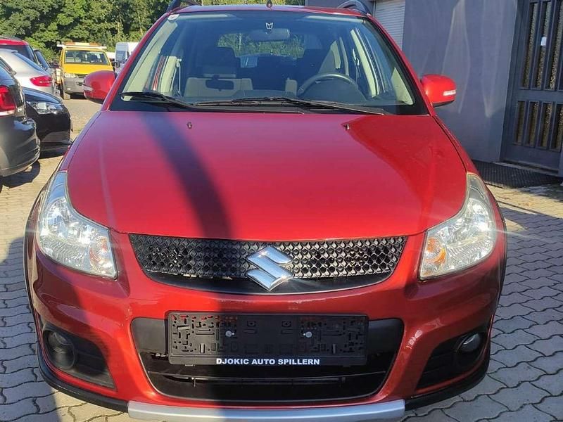 Orange Gebraucht 2013 Suzuki SX4 GLX SUV | € 6.990 - Bild 1/4