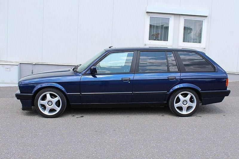 Gebraucht BMW 320 129 PS (94 kW) 1994 Blau Kombi
