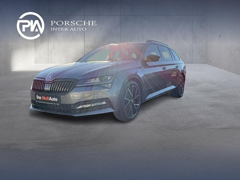 Mittelgrau metallic Gebraucht 2024 Skoda Superb SportLine Kombi | € 39.950 - Bild 1/4
