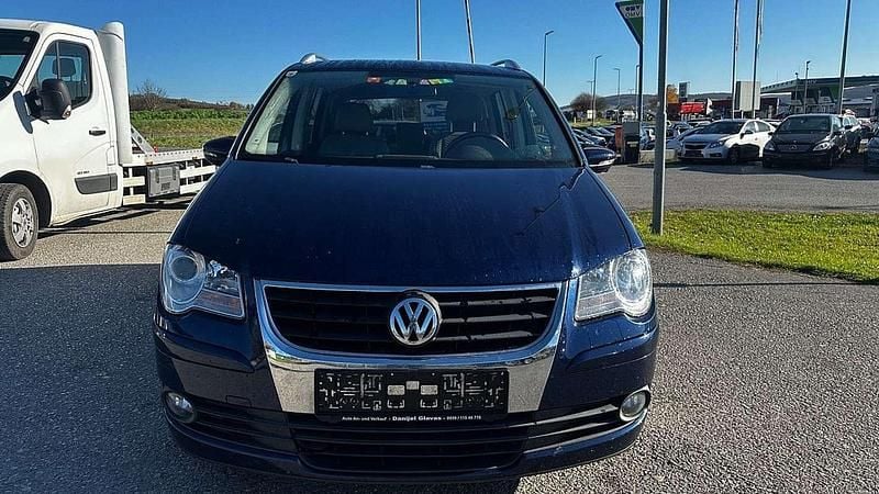 Blau Gebraucht 2009 VW Touran Edition Van / Kleinbus | € 2.590 - Bild 1/4