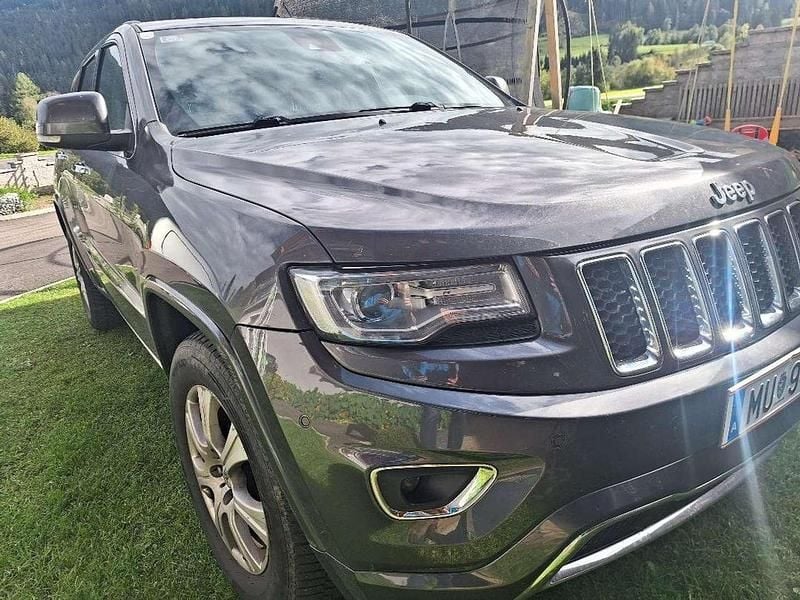 Grau Gebraucht 2015 Jeep Grand Cherokee Overland SUV | € 7.999 - Bild 1/4
