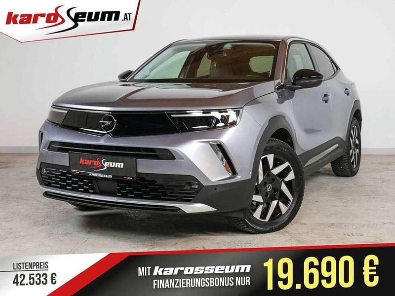 Grau Gebraucht 2023 Opel Mokka-e Elegance SUV | € 20.390 (Guter Preis) - Bild 1/4