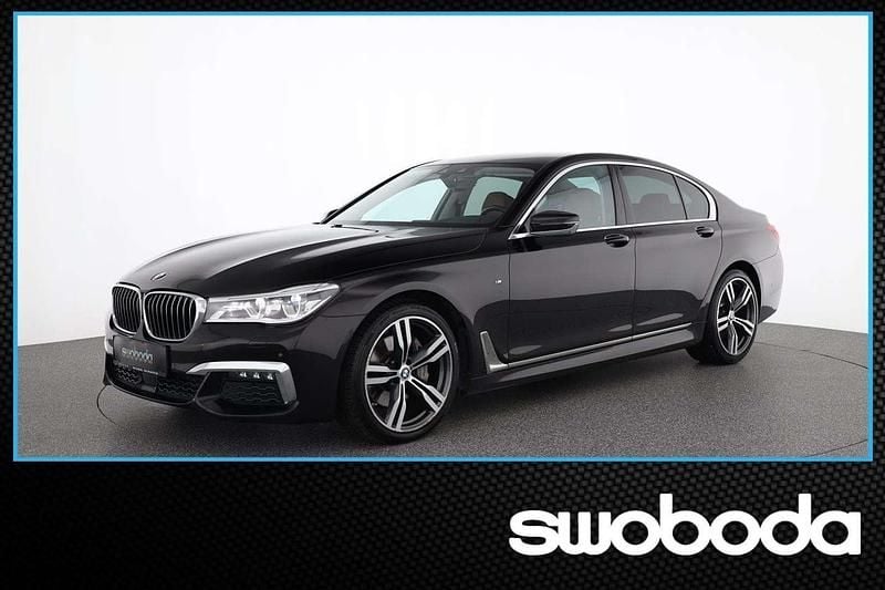 Almandinbraun Gebraucht 2018 BMW 740 M Sport Limousine | € 31.980 (Superpreis) - Bild 1/4