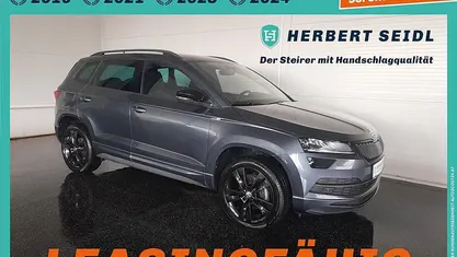 Grau Gebraucht 2021 Skoda Karoq SportLine SUV | € 26.880 (Fairer Preis)