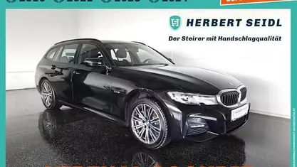 Black sapphire metallic Gebraucht 2021 BMW 330e Kombi | € 28.880 (Fairer Preis)