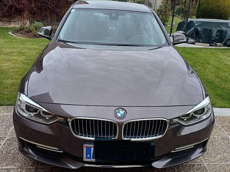 Braun Gebraucht 2011 BMW 320 Limousine | € 20.500 - Bild 1/4