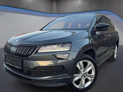gebraucht Skoda Karoq 15 TSI Sportline DSG *AHK*Kamera*Keyless*Virtual*