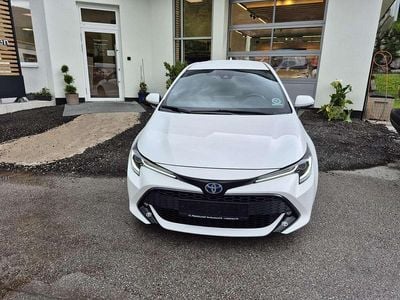 Gebraucht Toyota Corolla Hybrid Design 184 PS (135 kW) 2022 Weiß Limousine