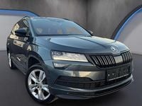 gebraucht Skoda Karoq 15 TSI Sportline DSG *AHK*Kamera*Keyless*Virtual*