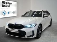 Gebraucht BMW 330e 184 PS (135 kW) 2023 Mineralweiß Kombi