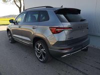 gebraucht Skoda Karoq Sportline 2.0TDI DSG 4x4 AHK Matrix Pano Sound Leder 19 Zoll