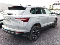 gebraucht Skoda Karoq Selection TSI 150 DSG Pano AHK NavC SideA Leder ACC