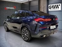 Gebraucht BMW X6 M Sport 298 PS (219 kW) 2024 Tansanitblau ii meta SUV