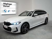 Gebraucht BMW 330e 184 PS (135 kW) 2023 Mineralweiß Kombi