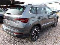 gebraucht Skoda Karoq Selection TSI 150 DSG Pano AHK NavC SideA Lounge ACC