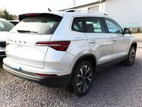 gebraucht Skoda Karoq Selection TSI 150 DSG Pano AHK NavC SideA Lounge ACC