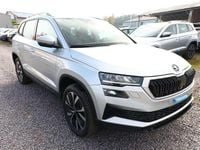 gebraucht Skoda Karoq Selection TSI 150 DSG Pano AHK NavC SideA Lounge ACC