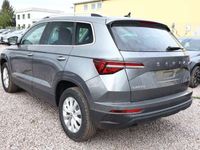 gebraucht Skoda Karoq TSI 150 DSG Amb LED Nav Kessy ACC Kam SunS