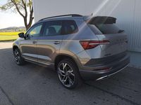 gebraucht Skoda Karoq Sportline 2.0TDI DSG 4x4 AHK Matrix Pano Sound Leder 19 Zoll