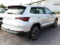 gebraucht Skoda Karoq Selection DSG Pano AHK NavC SideA Leder ACC Kes...