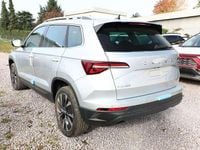 gebraucht Skoda Karoq Selection TSI 150 DSG Pano AHK NavC SideA Leder...