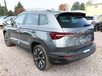 gebraucht Skoda Karoq Selection TSI 150 DSG Pano AHK NavC SideA Lounge ACC