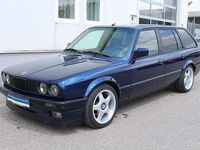 Gebraucht BMW 320 129 PS (94 kW) 1994 Blau Kombi