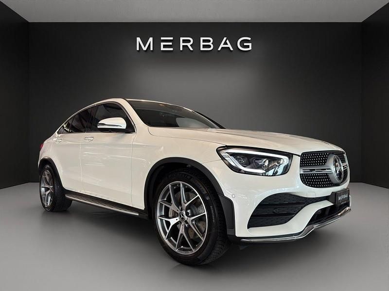 Weiss Gebraucht 2021 Mercedes GLC300 AMG line Coupé | CHF 40’520 (Fairer Preis) - Bild 1/4