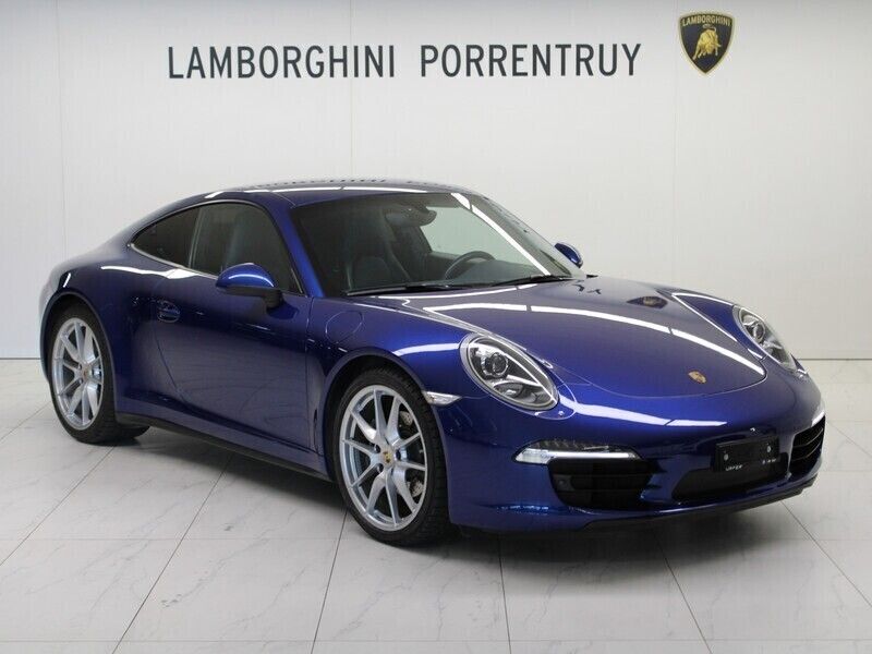 Blau Gebraucht 2013 Porsche 911 Carrera 4 Coupé | CHF 69’500 - Bild 1/4