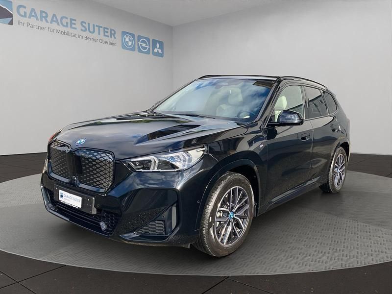 Schwarz Gebraucht 2023 BMW iX1 Luxury Line SUV | CHF 49’300 (Fairer Preis) - Bild 1/4
