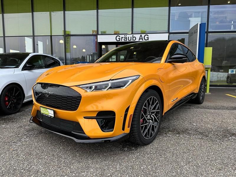 Orange Gebraucht 2022 Ford Mustang Mach-E GT SUV | CHF 59’900 - Bild 1/4