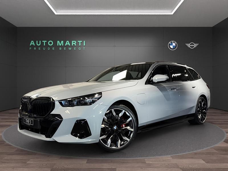 Gebraucht BMW 550e Comfort Edition 489 PS (359 kW) 2025 Grau Kombi