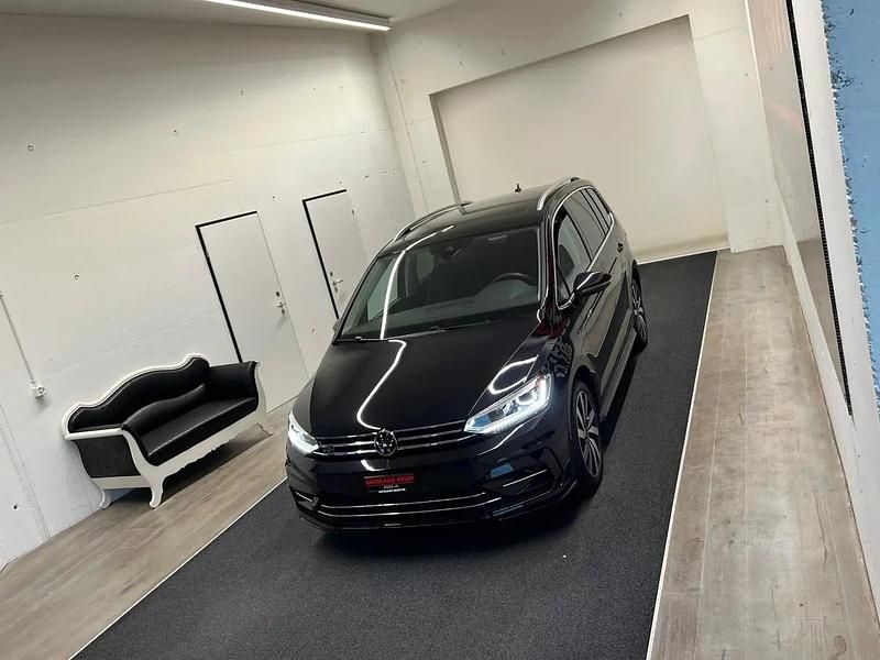 Gebraucht VW Touran Highline 150 PS (110 kW) 2025 Schwarz Van / Kleinbus