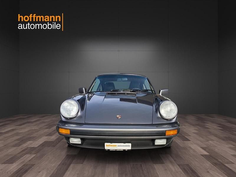 Grau Gebraucht 1986 Porsche 911 Carrera Coupé | CHF 88’500 - Bild 1/4