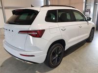 gebraucht Skoda Karoq Sportline Plus Edition 1.5 TSI 150 PS DSG-Navi-ACC-SHZ-RFK-18"-Sofort