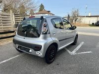 Gebraucht Peugeot 107 68 PS (50 kW) 2010 Kleinwagen