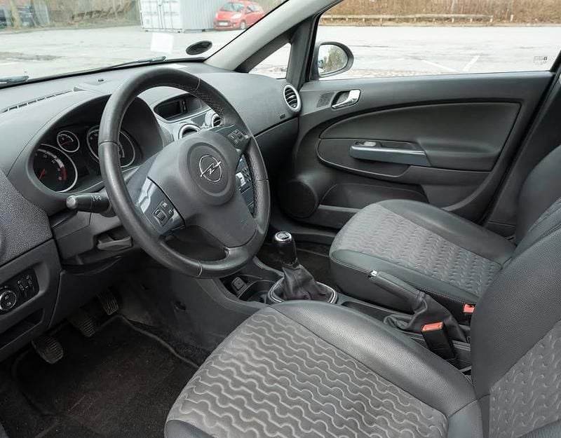 Brugt Opel Corsa 101 HK (74 kW) 2012 Brun Hatchback