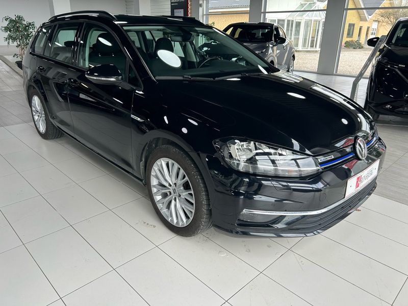 Deep black metallic Brugt 2018 VW Golf VII Comfortline Stationcar | 159.900 kr. (Fair pris) - Billede 1/4