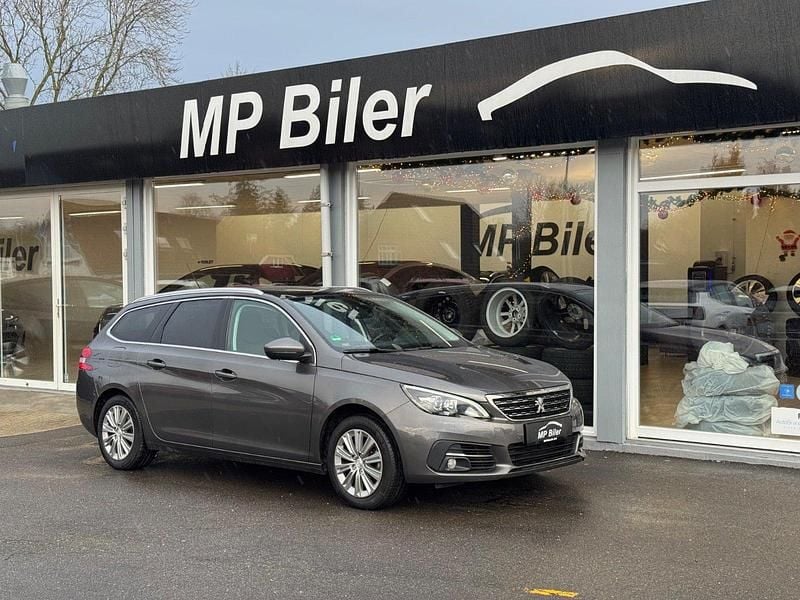 Gråmetal Brugt 2018 Peugeot 308 Allure Sky Stationcar | 99.700 kr. (Lidt for dyr) - Billede 1/4