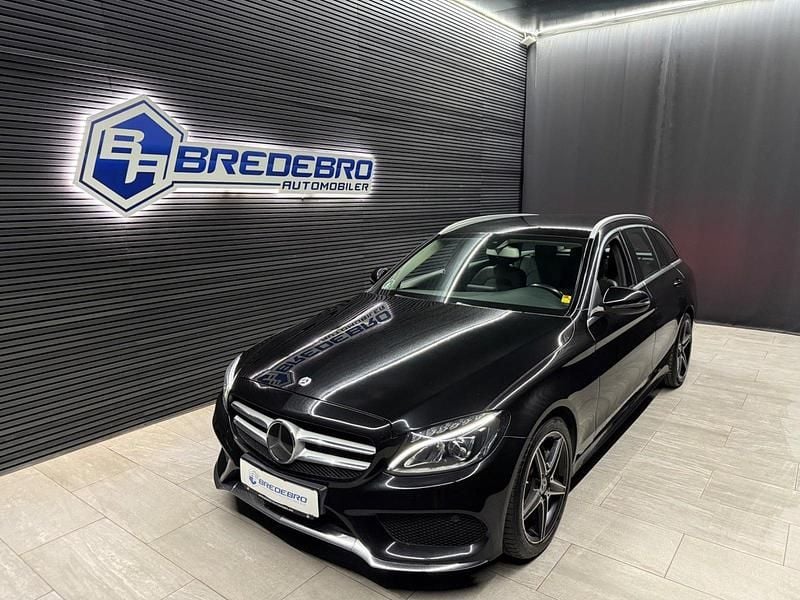 Brunmetal Brugt 2017 Mercedes C220 AMG line Stationcar | 249.500 kr. - Billede 1/4