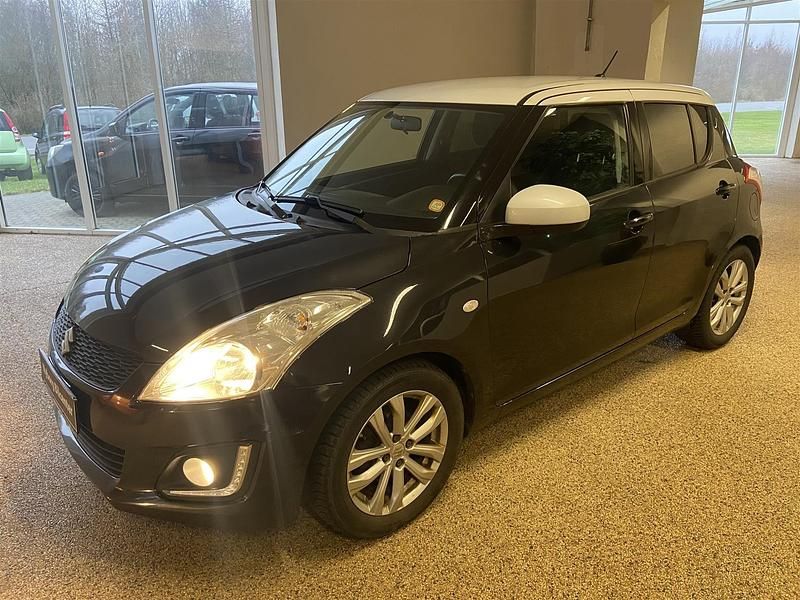 Sortmetal Brugt 2016 Suzuki Swift Action Hatchback | 64.900 kr. (Fair pris) - Billede 1/4