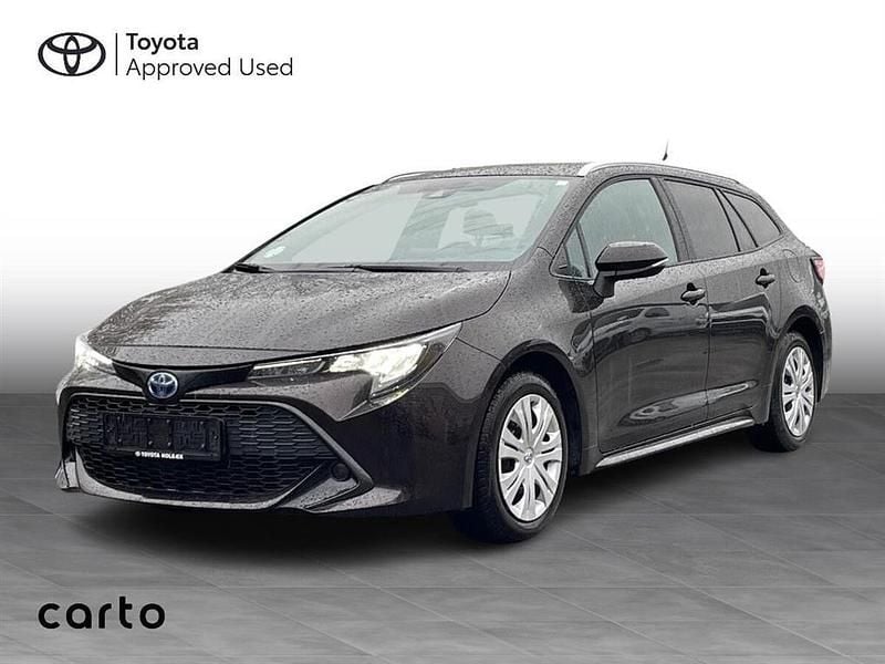 4w9 mocha brown Brugt 2022 Toyota Corolla Active Stationcar | 219.000 kr. (Fair pris) - Billede 1/3