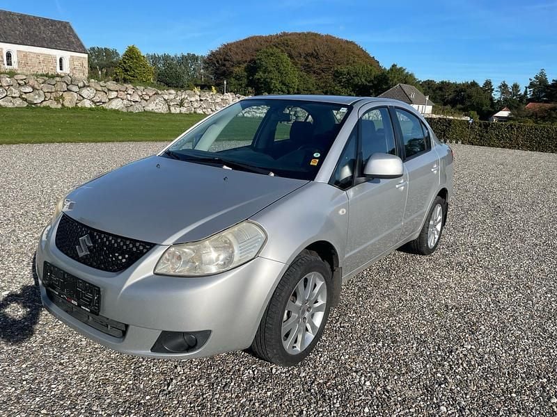 Sølv Brugt 2009 Suzuki SX4 GL Sedan | 19.800 kr. - Billede 1/4