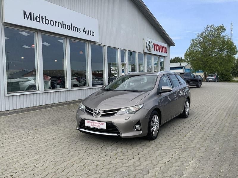 4v8 bronze metal Brugt 2013 Toyota Auris Comfort Stationcar | 99.900 kr. (Dyr) - Billede 1/4