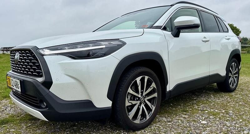 Perlemorshvid Brugt 2024 Toyota Corolla Cross Elegant SUV | 249.900 kr. - Billede 1/4