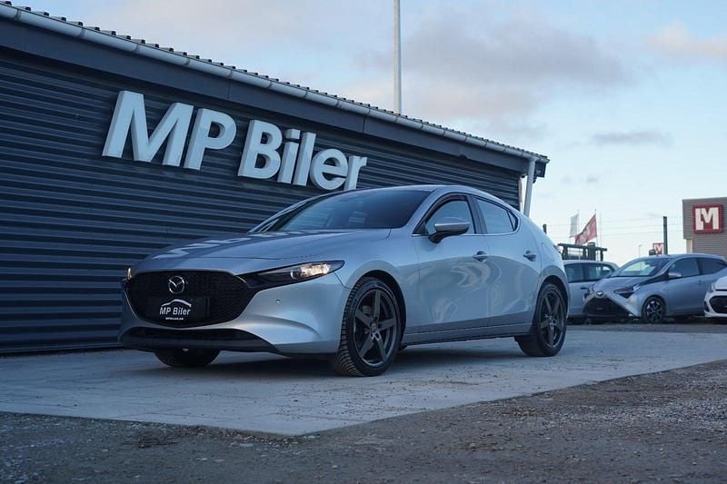 Sølvmetal Brugt 2022 Mazda 3 Cosmo Sedan | 194.900 kr. (Fair pris) - Billede 1/4
