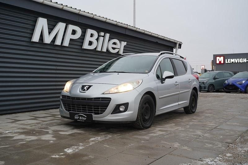 Sølvmetal Brugt 2011 Peugeot 207 Comfort plus Stationcar | 19.900 kr. (Fair pris) - Billede 1/4
