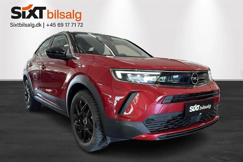 Rød/sort Brugt 2023 Opel Mokka-e Elegance SUV | 142.900 kr. (Fair pris) - Billede 1/4